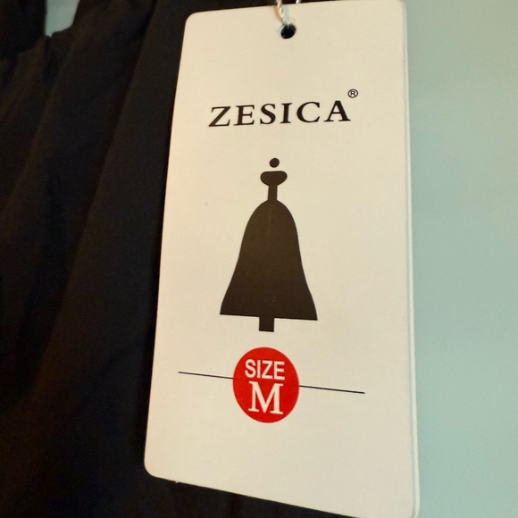 Black Ruffle Halter Mini Dress - Picture 6 of 6